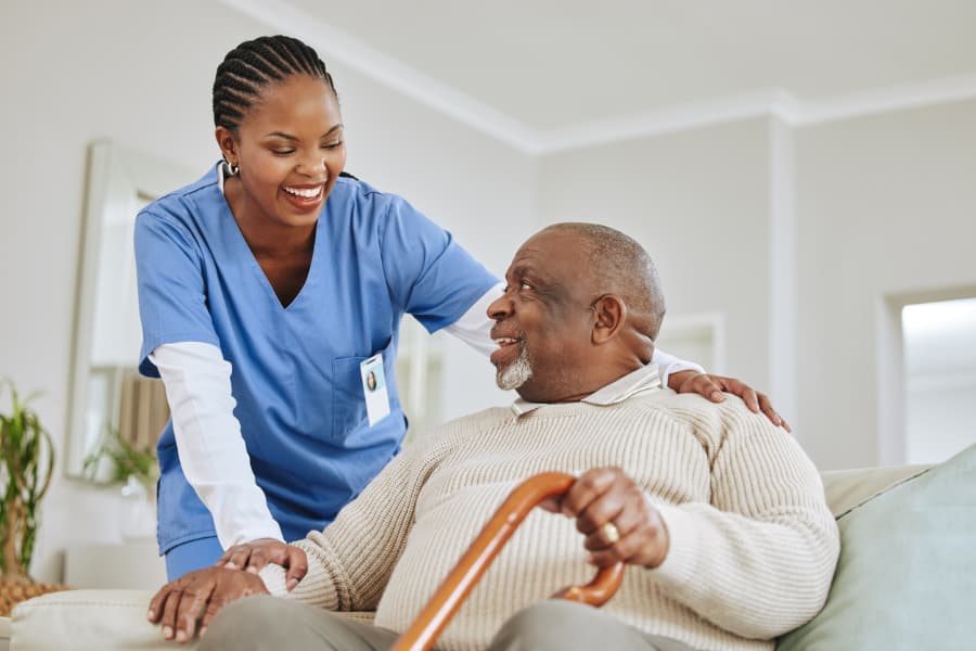 Live-in caregiver helping a senior at home overnight in Central Florida