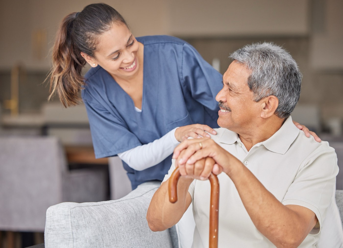 CNA helping a senior recover at home after a hospital discharge in Central Florida